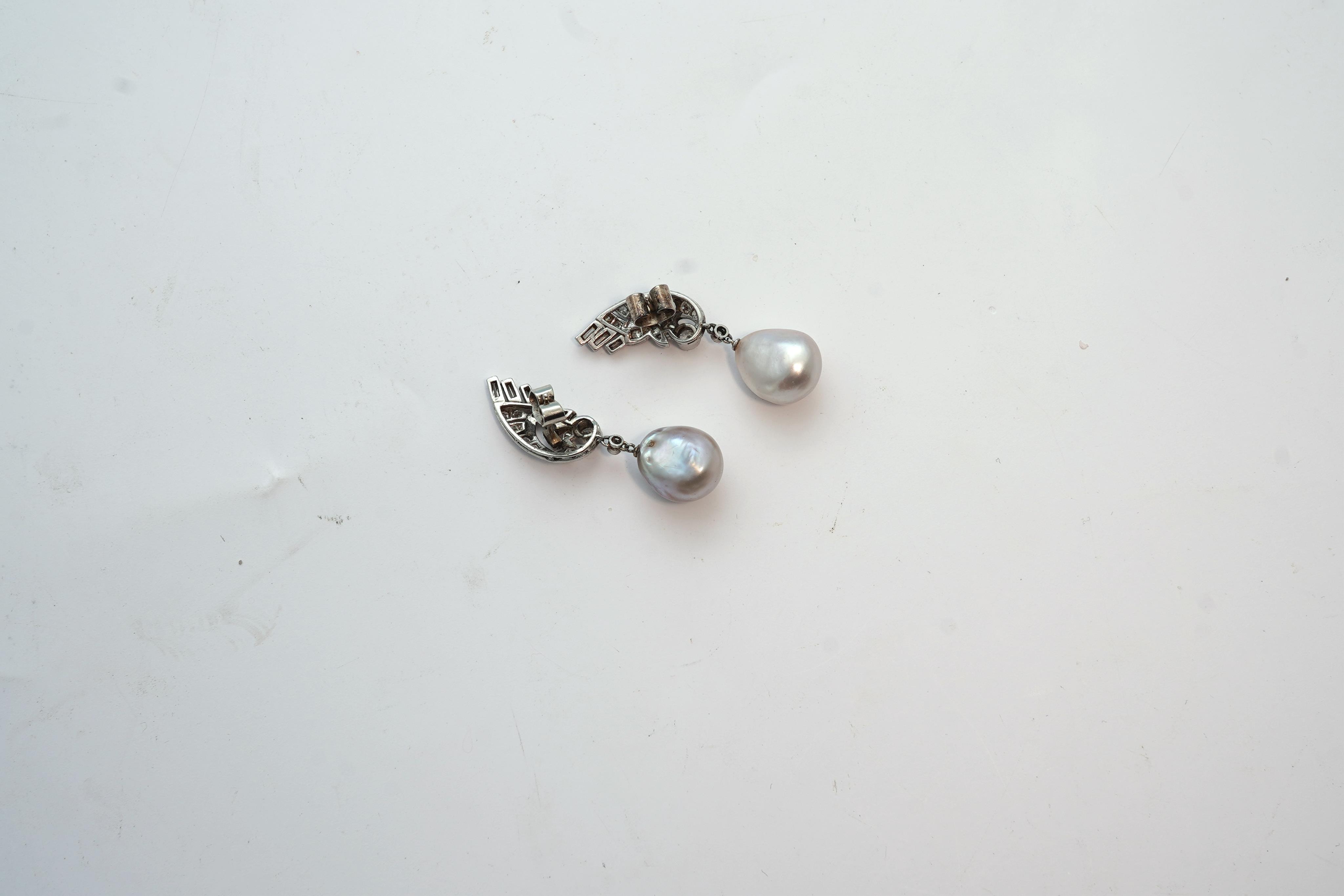 A fine pair of Art Deco natural pearl and diamond earrings, 1930s